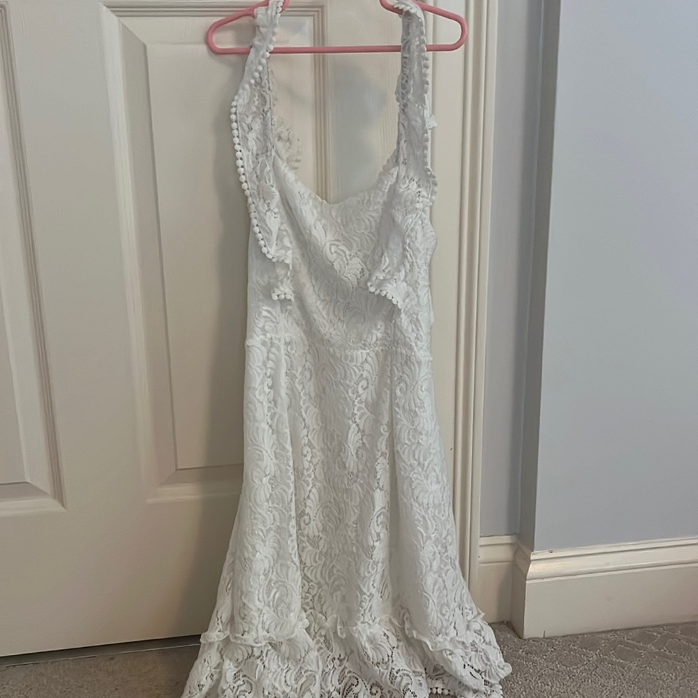 White lace open back tie dress